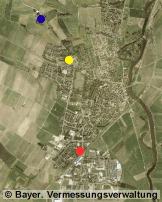 Oettingen aus der Luft, ringsum sind Felder und Grnflchen zu erkennen. Fnf Mobilfunksender versorgen den Ort.